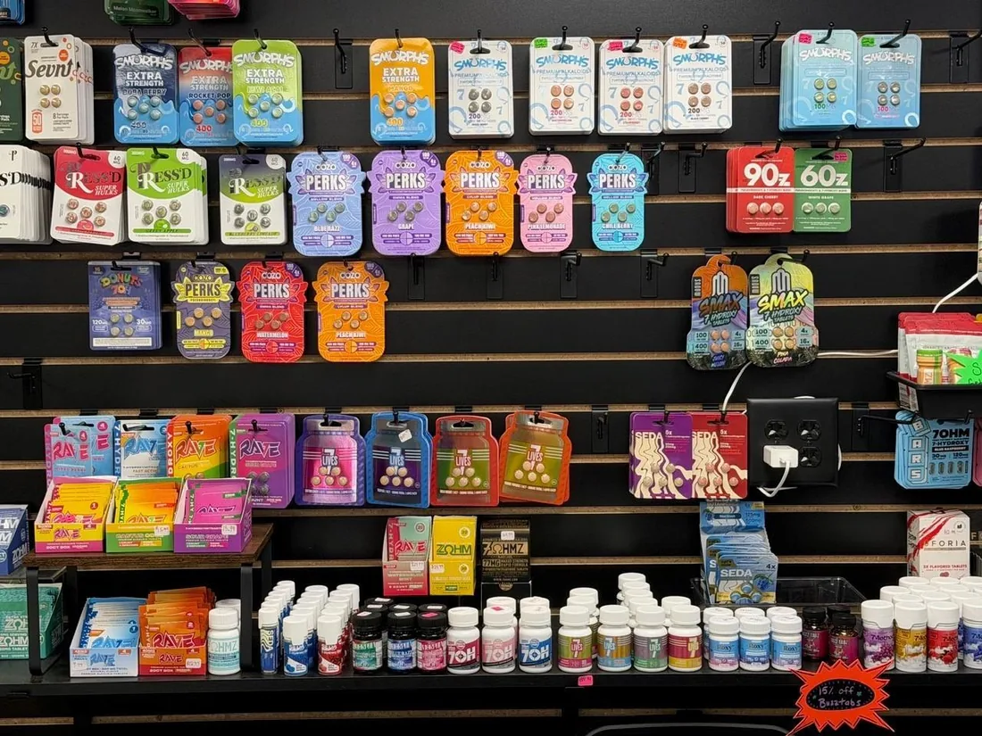 Kratom and botanical packs on the wall